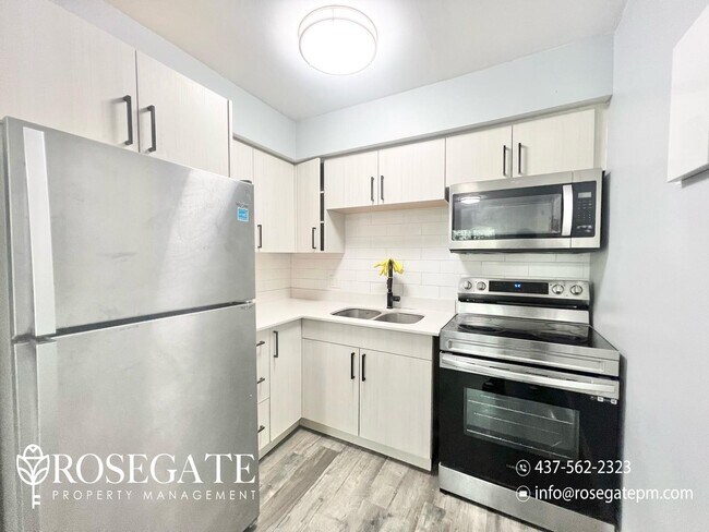 Photo du bâtiment - Spacious 3-Bedroom Apartment | 1,250 Sq Ft...