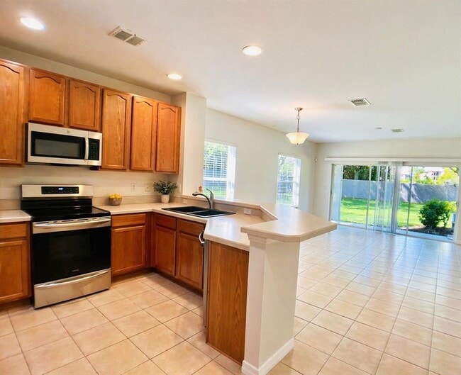 Building Photo - 9349 Jasmine Flower Ln