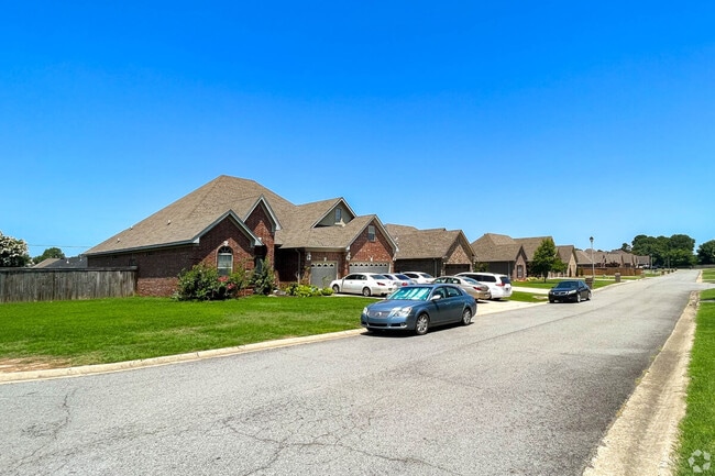 Cars line a street in a Conway neighborhood.