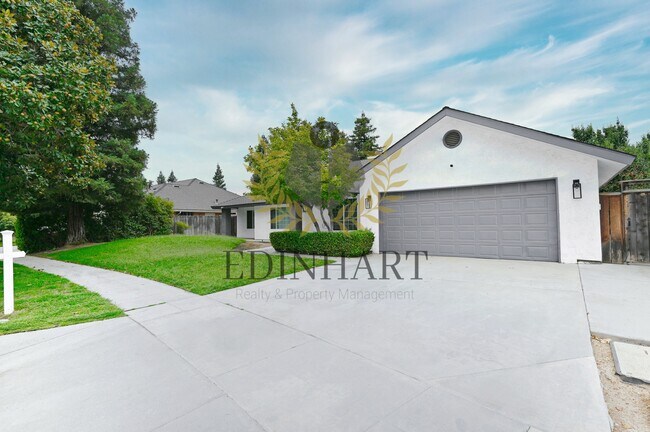 Building Photo - 7721 N Cedar Ave