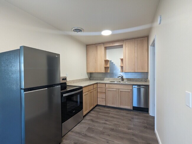 Foto del edificio - "Charming 3-Bedroom Duplex with Granite Touches & Gleaming Hardwood Floors in Seattle's Vibrant B...