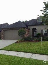 Building Photo - 9134 Magnolia Leaf Ave