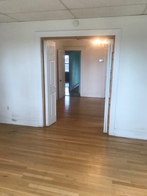 View from sun room through living room and hall. - 31 Cherry St