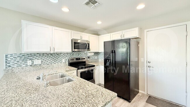 Foto del edificio - 6032 E Desert Spoon Ln