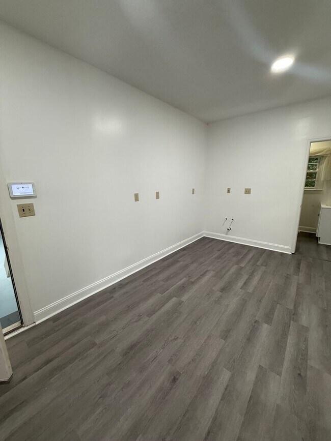 Building Photo - Spacious 5-Bedroom Home on a Corner Lot in...