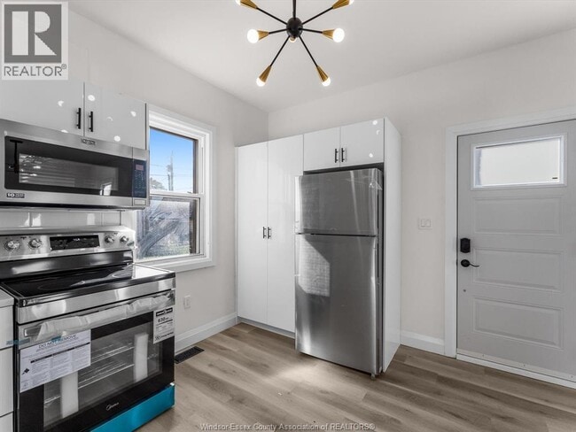 Building Photo - 1067 Drouillard Rd