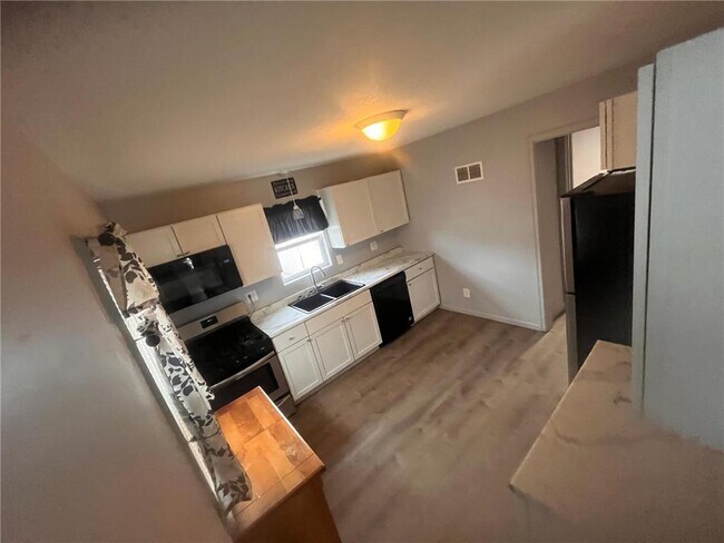 Building Photo - 3825 Noble Ave N