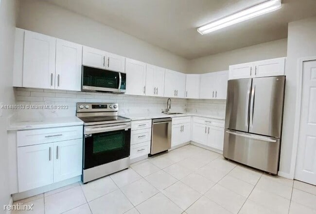 Building Photo - 3 br, 3 bath House - 8551 NW 138th St Apt ...