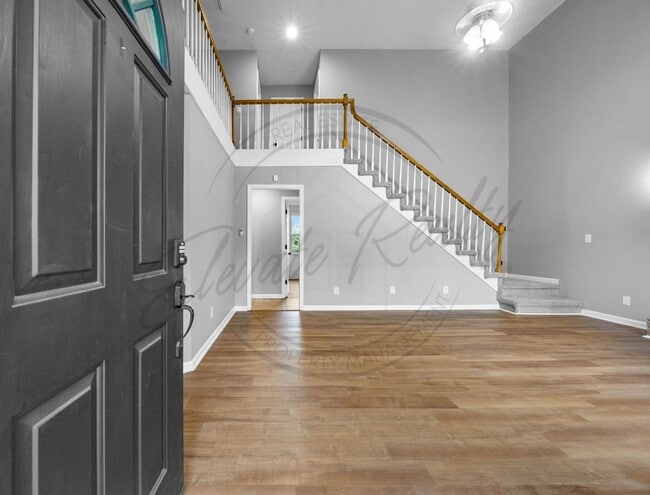Building Photo - Four Bedroom Two Story with Two Car Garage...