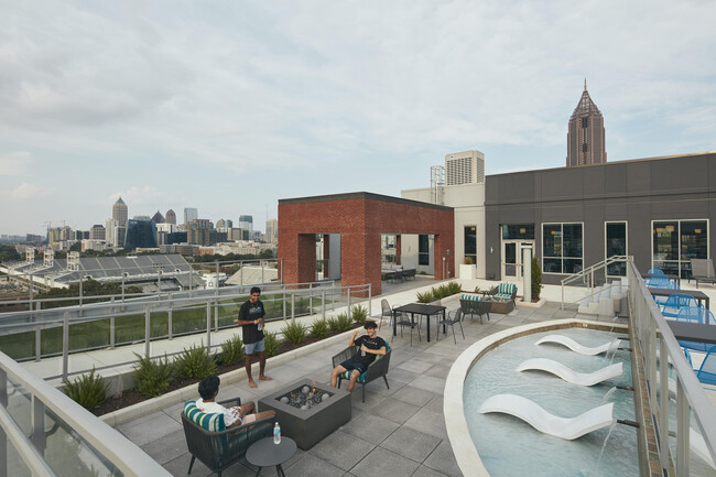 Experience city living at its finest with this elegant rooftop retreat, offering breathtaking skyline vistas. - Inspire