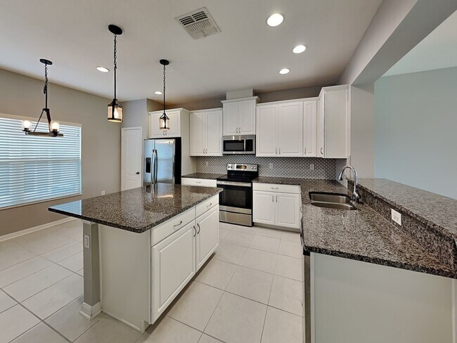 Building Photo - 7929 Ava Jade Aly