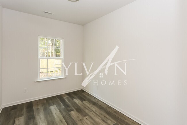 This lovely 4 bedroom, 3 bathroom home is ... photo'