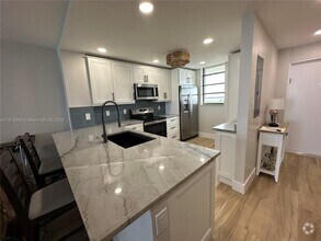 Building Photo - 9940 S Ocean Dr
