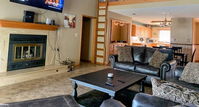 From family room to kitchen - 107 S Abbey Ln