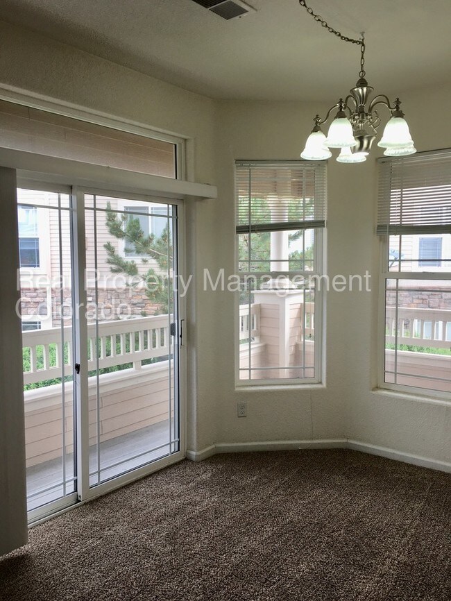 Building Photo - 8497 S HOYT WAY 202