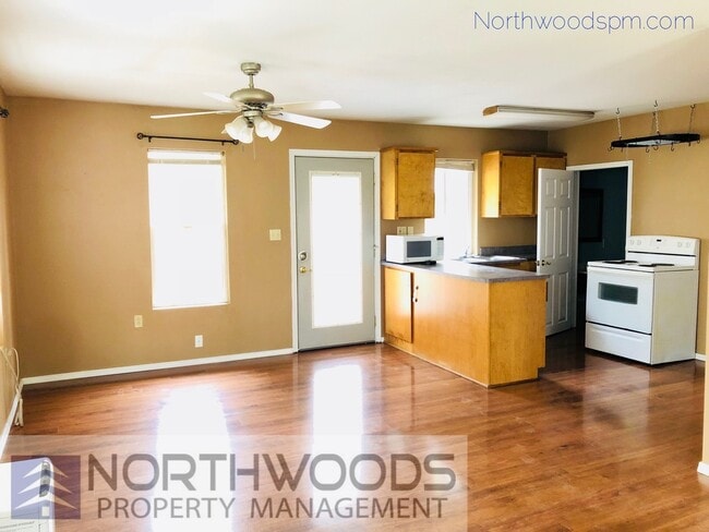 Building Photo - Country Feel - 1+ Bedroom/1 bath - Attached garage