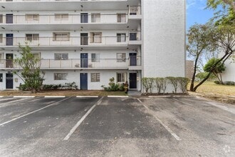 Building Photo - 8550 N Sherman Cir