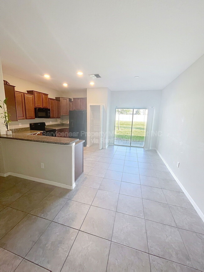 Building Photo - 7648 Ginger Lily Ct