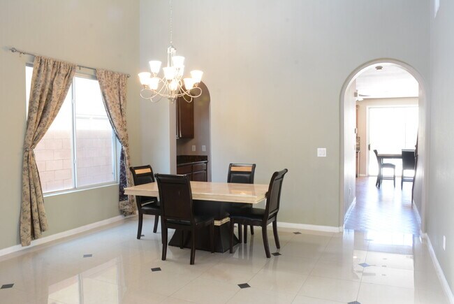 Building Photo - "Spacious 4-Bedroom Oasis with Granite Touches and Cozy Fireplace in Las Vegas!"