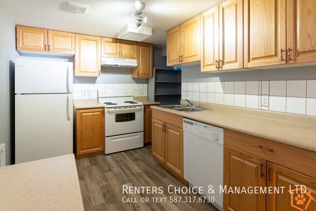 Building Photo - Pet Friendly Basement Suite with Garage, Utilities Included