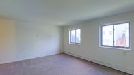 Located at 124 N North Carolina Ave in Atlantic City, New Jersey, this single-floor property offers a clean and straightforward layout well-suited for comfortable living. The interior is finished with wall-to-wall carpeting that provides warmth underfoot throughout the space. The rooms are characterized by crisp white walls and smooth ceilings, creating a bright and neutral backdrop that is easy to personalize. Natural light filters in through multiple windows, contributing to an open and airy atmosphere within the unit. Baseboard heating units are installed along the lower walls, ensuring efficient and consistent warmth throughout the colder months. The overall design is functional and uncluttered, with a practical layout that maximizes the use of available space. Situated in Atlantic City, the property benefits from its urban location with access to the city's amenities, dining, entertainment, and transportation options. The clean, move-in-ready condition of the interior, combined with its efficient heating system and natural light, makes this a practical and comfortable single-floor property in a well-known New Jersey shore destination.