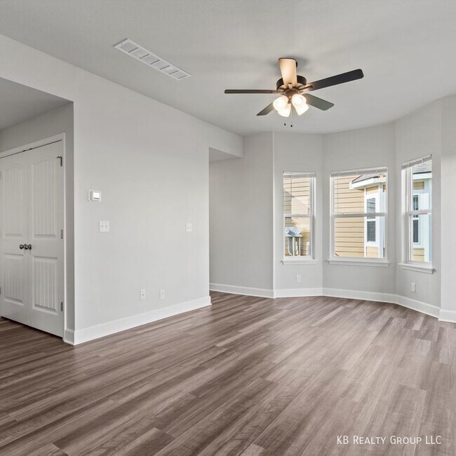 Building Photo - Brand New 3 Bed 2 Car End Unit Townhome in...