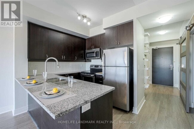 Building Photo - 8130-8130 Birchmount Rd