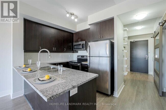 Photo du bâtiment - 8130-8130 Birchmount Rd