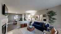 Located in Indianapolis, IN, this single-floor residence offers a thoughtfully designed 2-bedroom, 2-bathroom layout that maximizes both comfort and functionality. The open-concept living, dining, and kitchen area forms the heart of the home, where rich hardwood-style flooring flows seamlessly throughout the main living spaces. The kitchen is well-equipped with warm wood cabinetry, granite countertops, stainless steel appliances including a dishwasher and over-the-range microwave, and a convenient peninsula that connects to the dining area. The dining space is defined by accent walls and recessed lighting, creating an inviting atmosphere for meals. The living room is bright and airy, featuring a vaulted ceiling, sliding glass doors that open to a private balcony, and ample natural light. The primary bedroom features plush carpet, a ceiling fan, large windows, and access to a private en-suite bathroom with a vanity and tub/shower combo. The second bedroom is equally comfortable with carpet flooring, a ceiling fan, and generous natural light. A second full bathroom with a tub/shower combination serves the additional bedroom. Two closets provide practical storage throughout the home, completing this well-rounded residential layout.