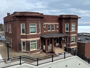 Building Photo - 110-114 North 6th Ave E