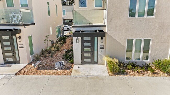 Building Photo - Exclusive Townhome in The Vue at Celebration Pointe