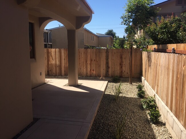 Most units have access to private side yard or balcony - 1818 Castillo Street