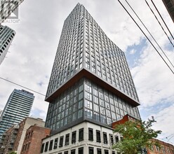 Building Photo - 100 Queen St E
