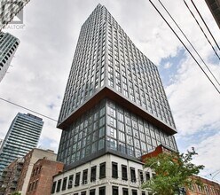 Building Photo - 100 Queen St E