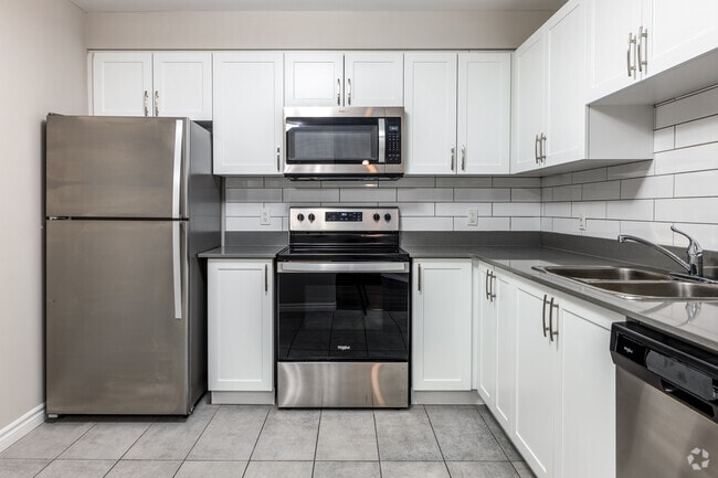 2BR, 2BA - 1,119SF - Kitchen - 220 Ira Needles Blvd