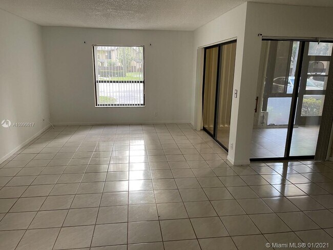 Building Photo - 3863 Cocoplum Cir