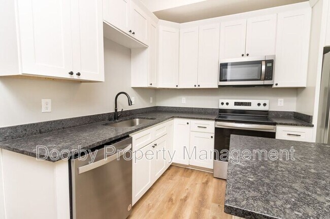 Foto del edificio - 905 W 39th St