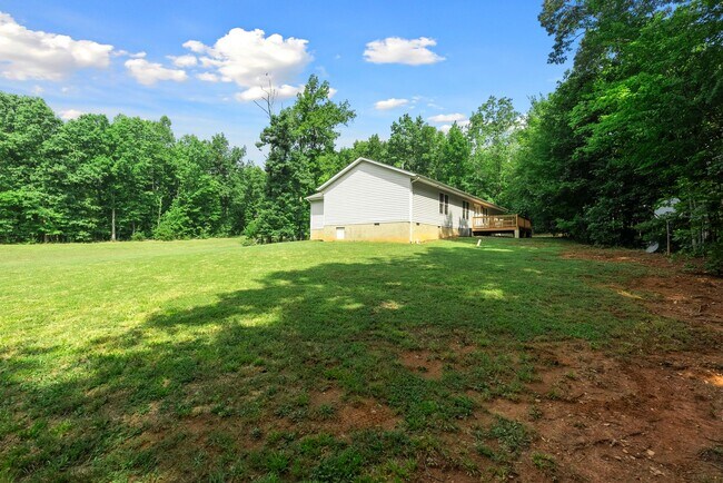 Building Photo - Private 3-Bedroom Home with Large Yard and...