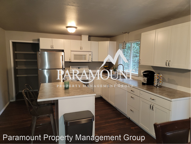 Building Photo - 3 br, 1 bath House - 7180 E Raintree Ln