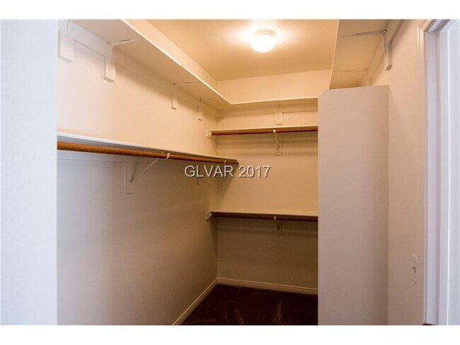 Building Photo - Gated Green Valley Ranch Townhome | 2 Bed | 2.5 Bath | 2-Car Garage
