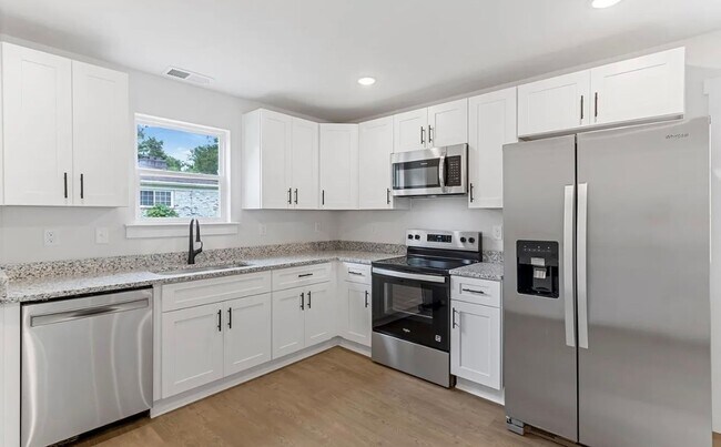 Photo - Brand New Duplex Available Now! House