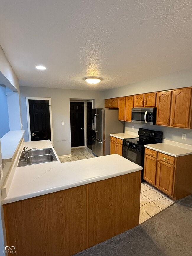 Foto del edificio - 9230 Eden Woods Ct
