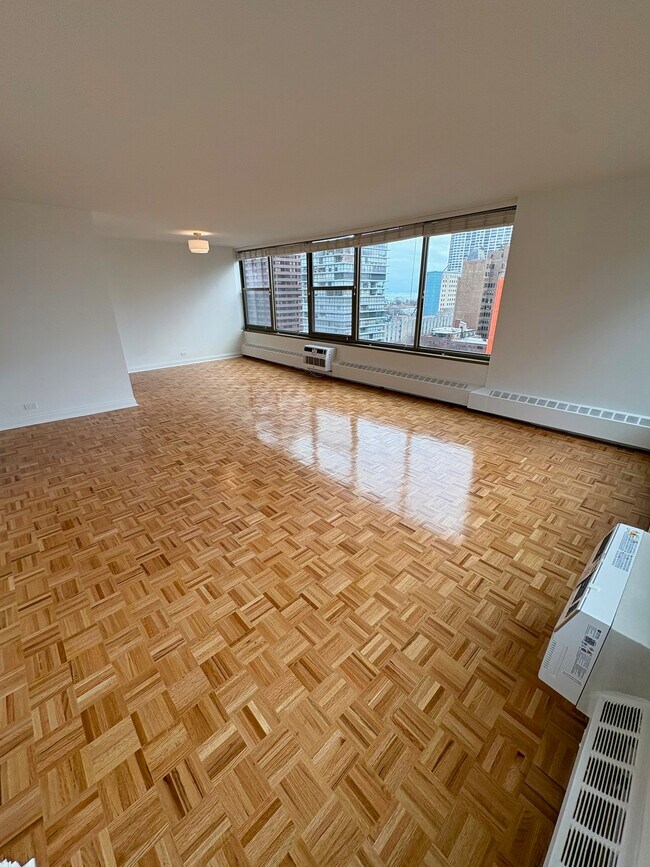 Sala de estar/Comedor - 360 W Wellington Ave