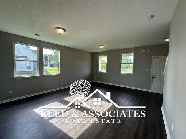 Building Photo - Charming Bartlett Home~3 Bedroom