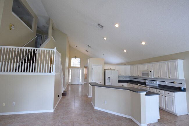 Foto del edificio - AMAZINGLY SPACIOUS 4-Bedroom Home with Loft in Gated Northshore at Lake Hart – Golf, Tennis & Lak...
