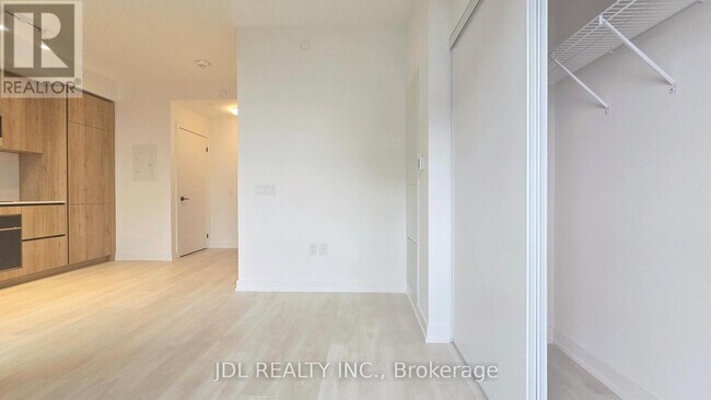 Building Photo - 117-1117 Broadway Ave