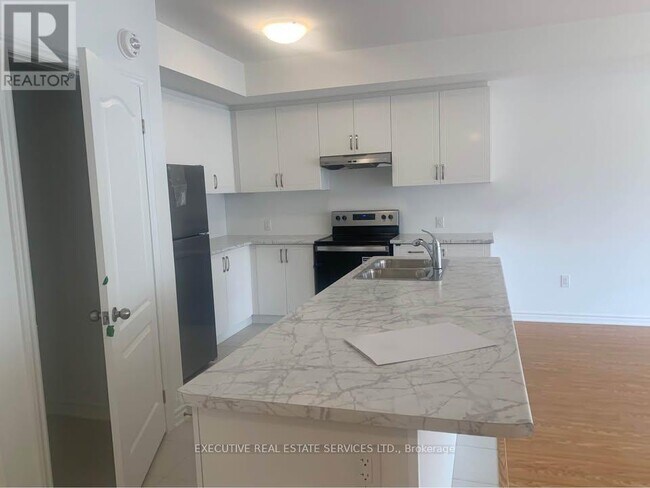 Photo du bâtiment - 439 Dougall Ave