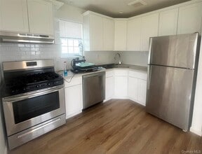 Building Photo - 62-61 De Costa Ave