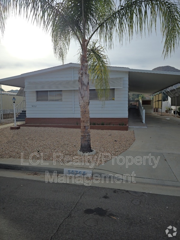 Building Photo - 30765 Cocos Palm Ave