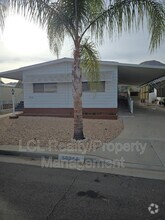 Building Photo - 30765 Cocos Palm Ave